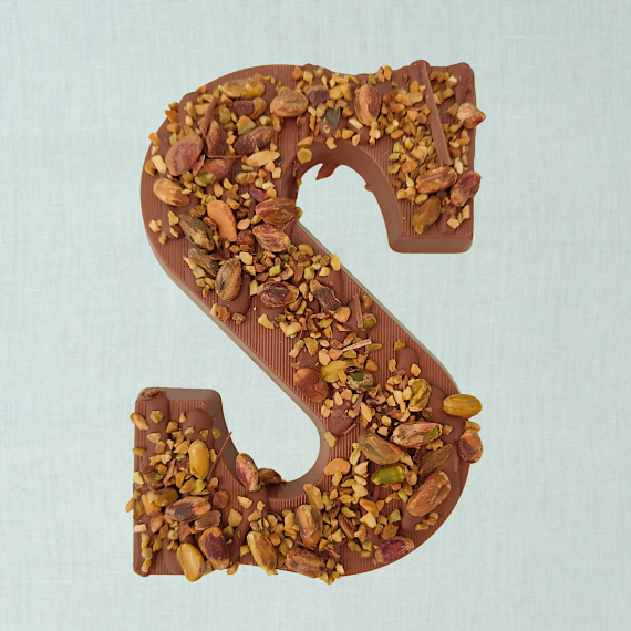 Luxe chocoladeletter melk pistache topping