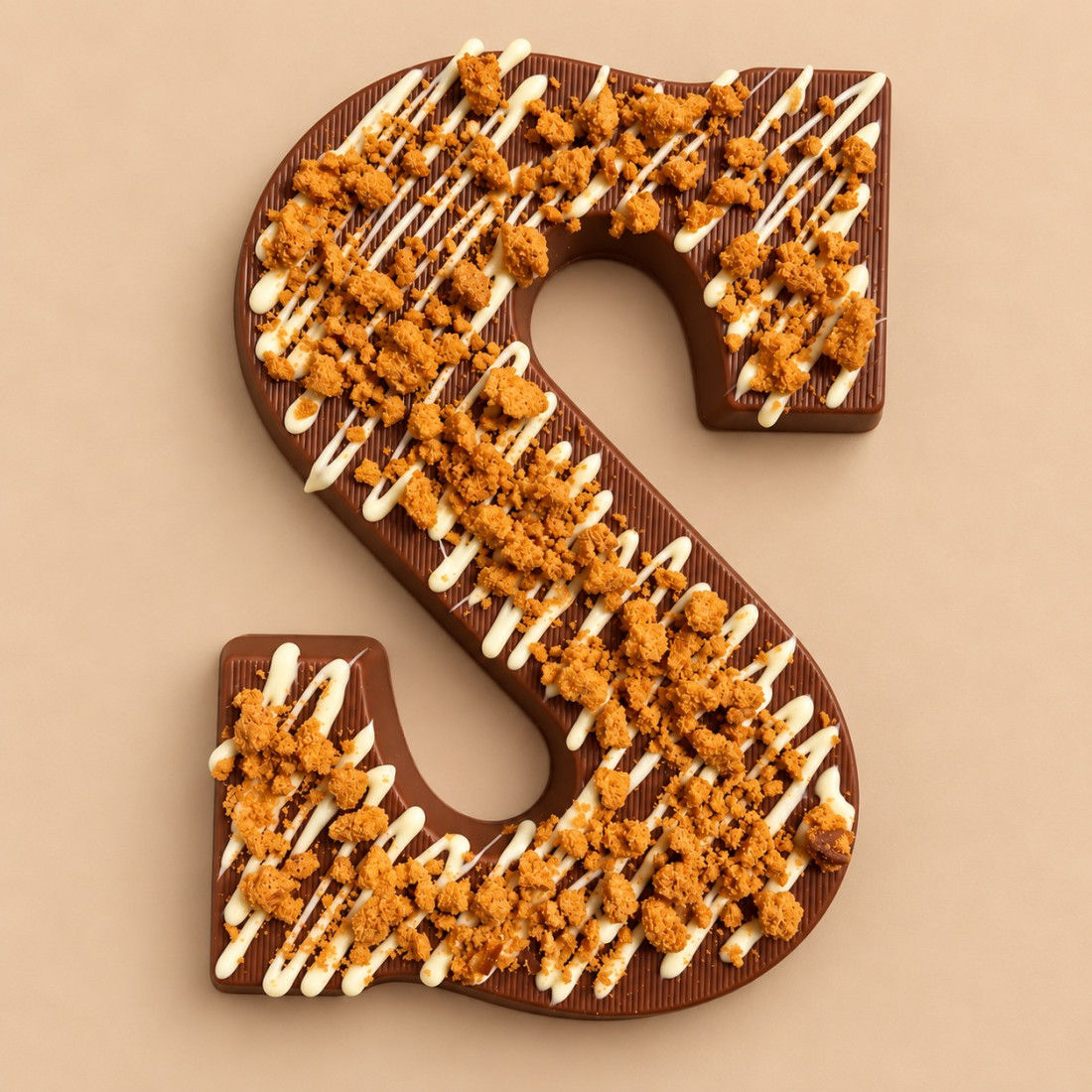 Luxe chocoladeletter melk met speculoos topping